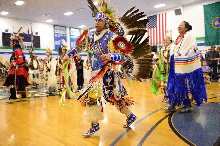 Native American dancers and musicians perform traditional dances and songs at the college’s annual powwow. 